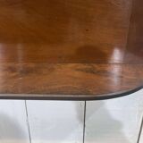 English mahogany shelf with its bevelled mirror from the early 20th century.