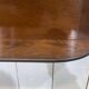 English mahogany shelf with its bevelled mirror from the early 20th century.