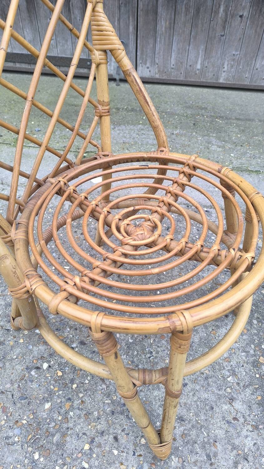 Rattan chair by Louis Sognot 1960