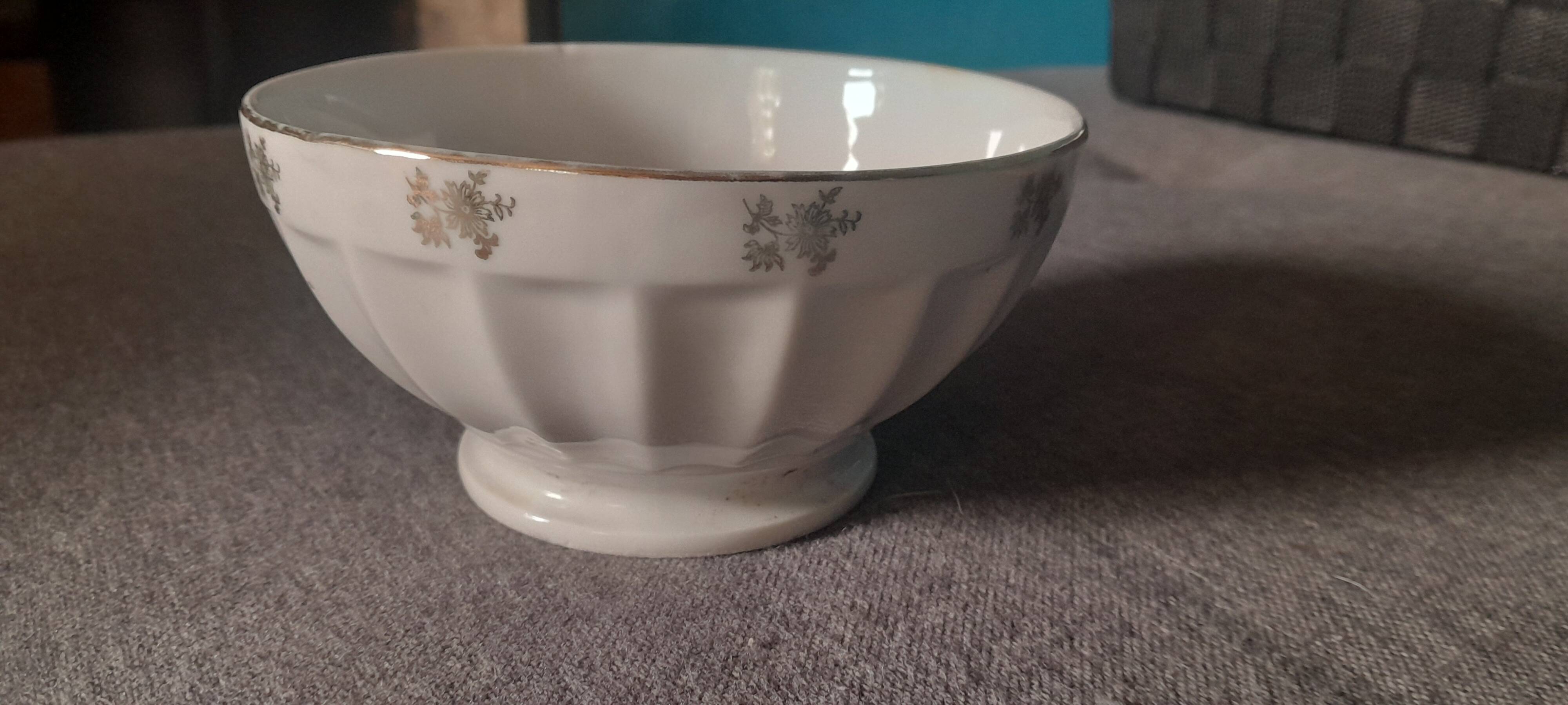 White earthenware bowl with decorative flowers