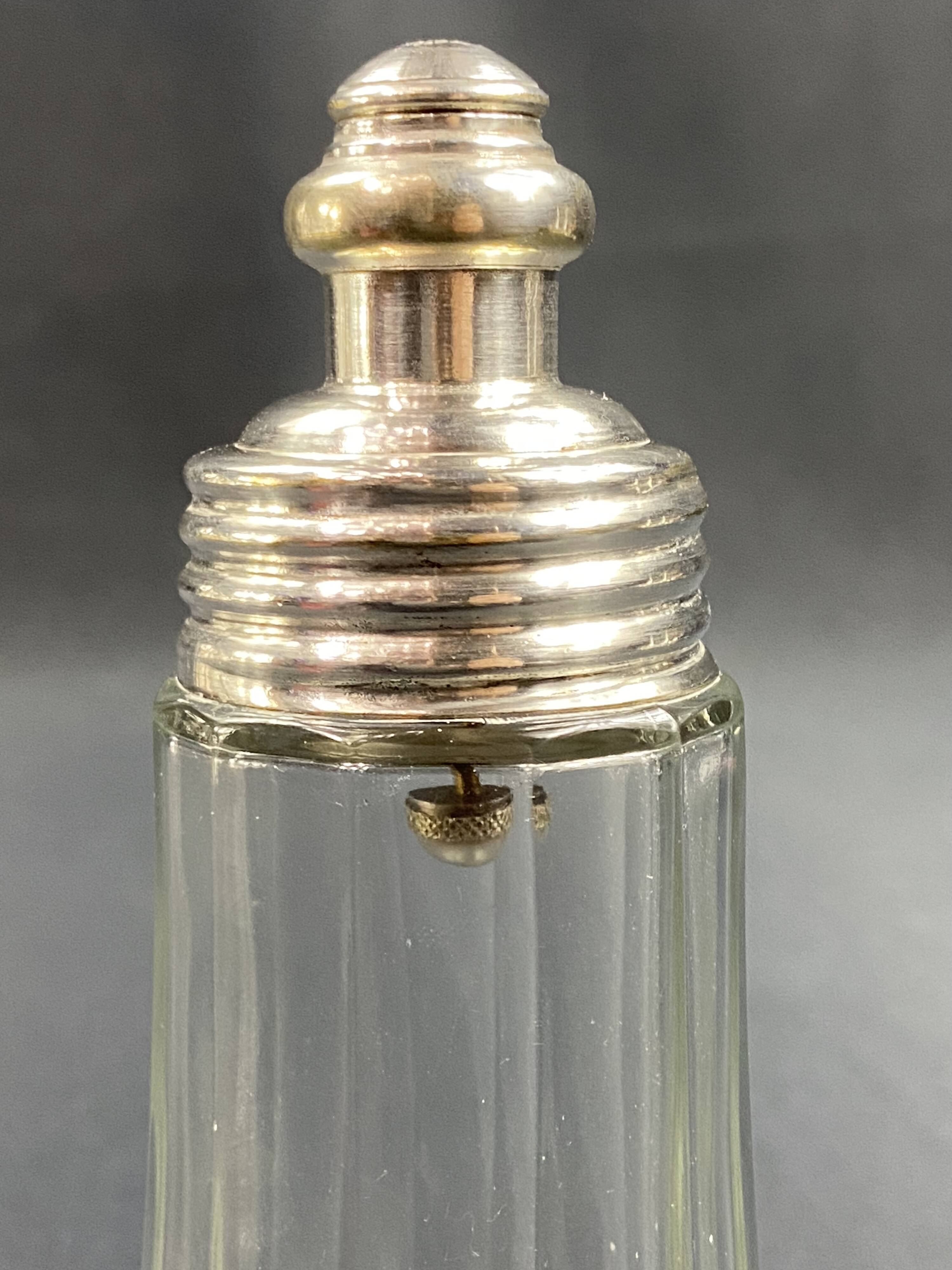 Glass and silver metal sugar shaker