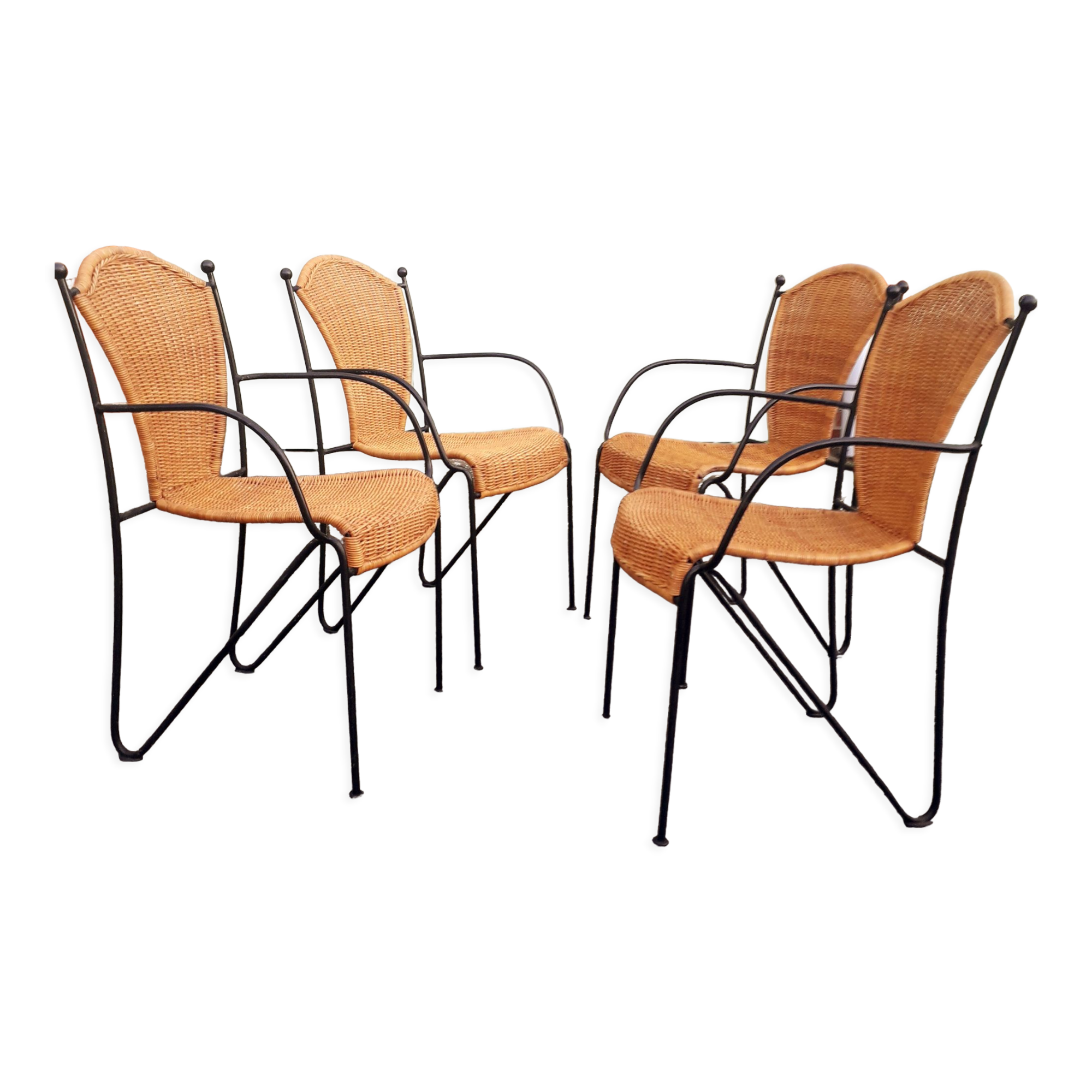 4 vintage wrought iron rattan chairs.