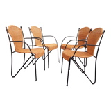 4 vintage wrought iron rattan chairs.