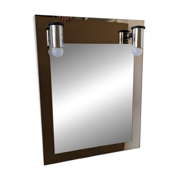 Vintage mirror with sconces.