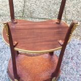 Louis XVI period pedestal table, in solid mahogany and veneer, and in gilded bronze.