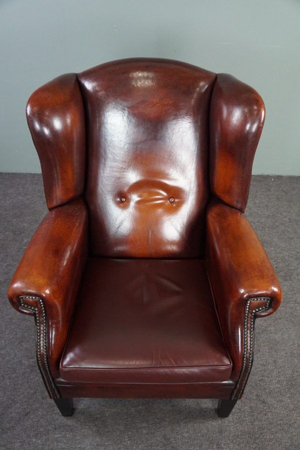 Patinated sheepskin armchair