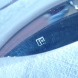 Cockerel + silver metal spoon