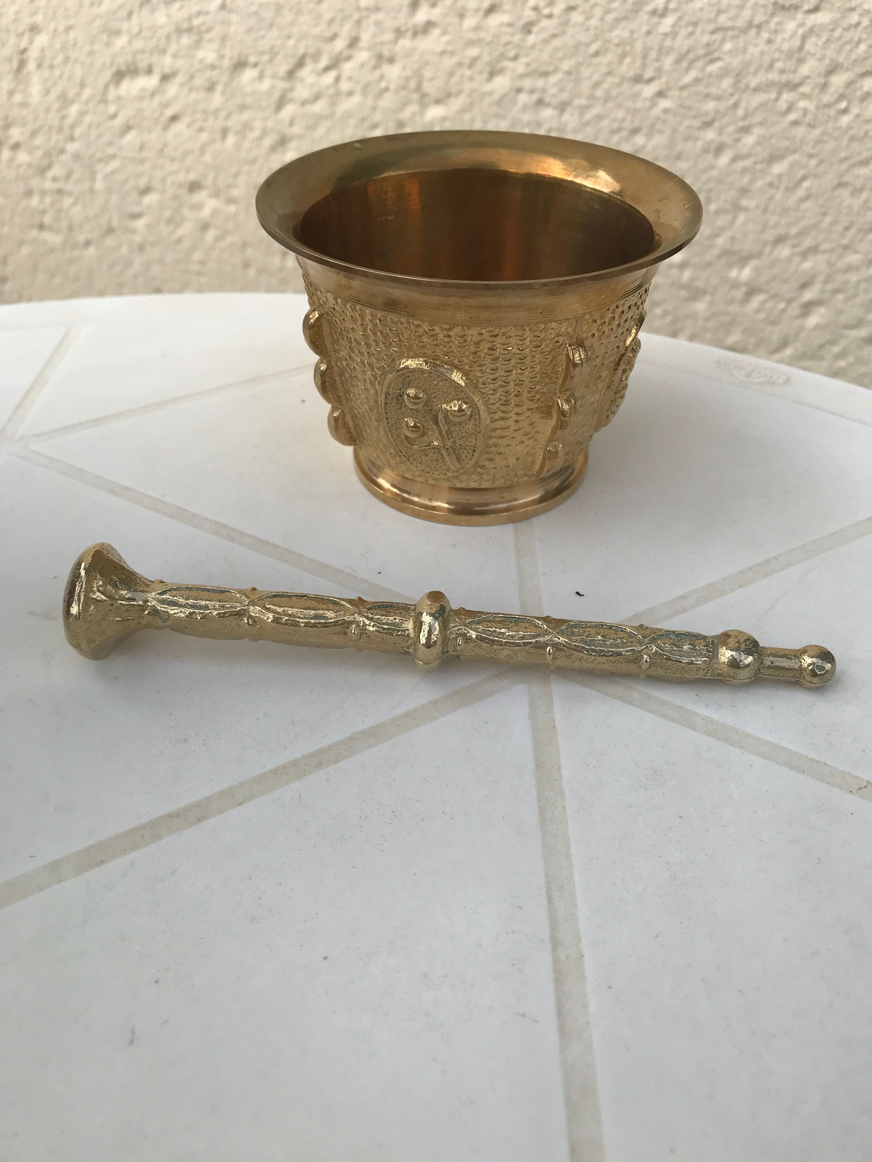 Mortar and its ancient bronze pestle