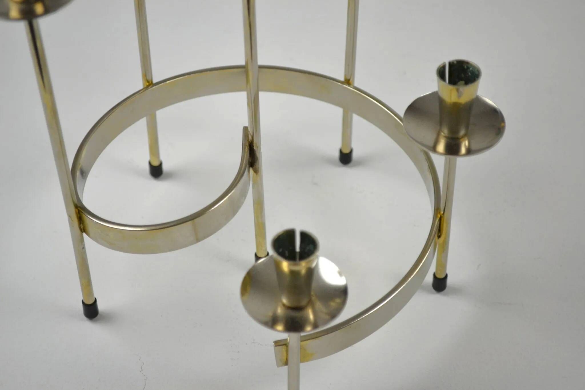 Pair of white metal candle holders "Spiral" by Gunnar Ander for Ystad-Metall, Sweden, 1960s.