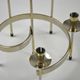 Pair of white metal candle holders "Spiral" by Gunnar Ander for Ystad-Metall, Sweden, 1960s.