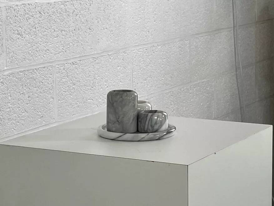 Set of marble candle holders with base