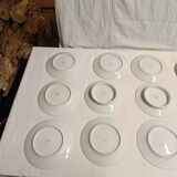 15 assiettes en porcelaine de Limoges
