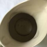 Barbotine pitcher with embossed tulip decoration and spike
