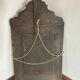 Mirror with brass repoussé frame