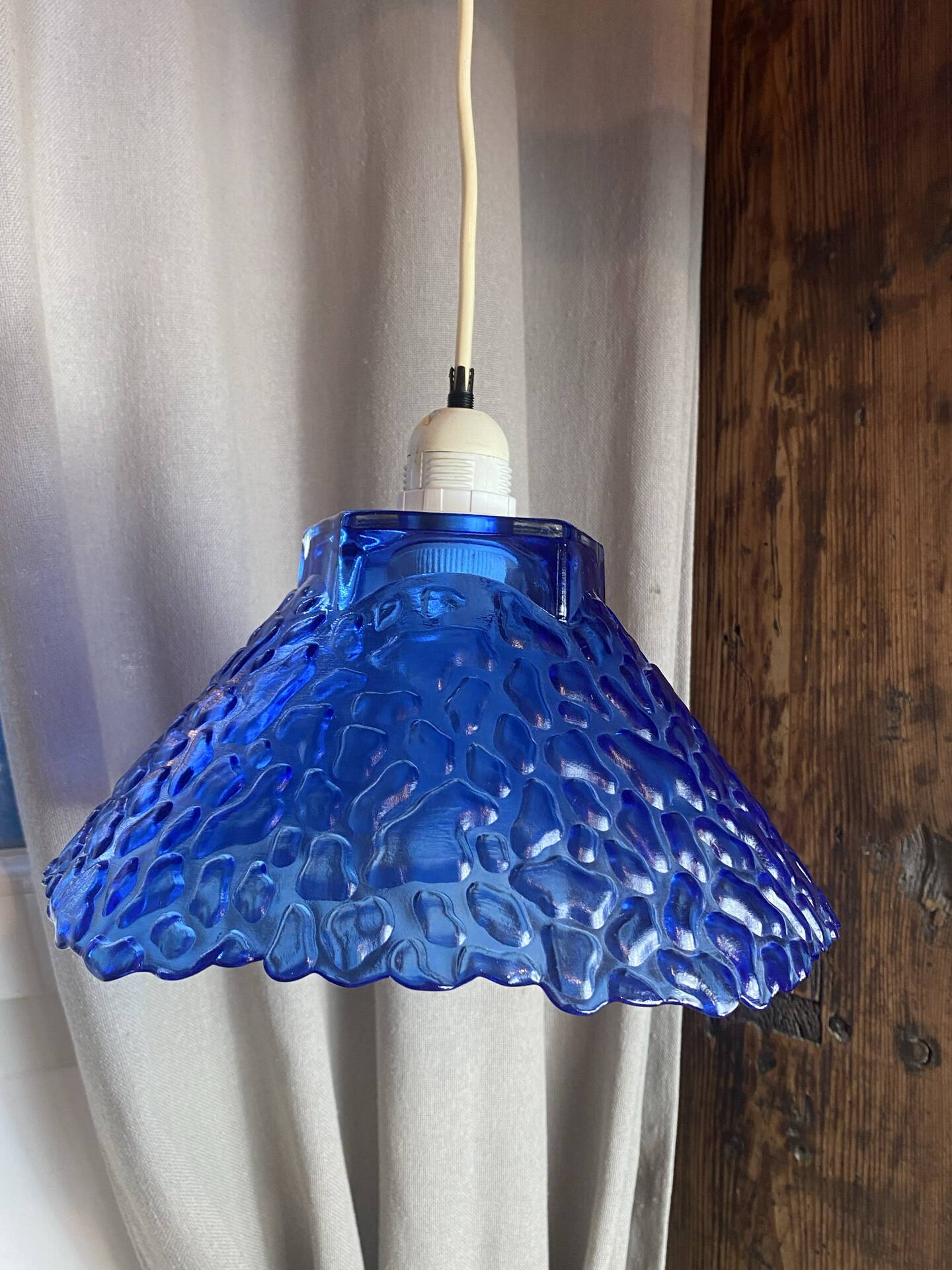Blue moulded glass suspension