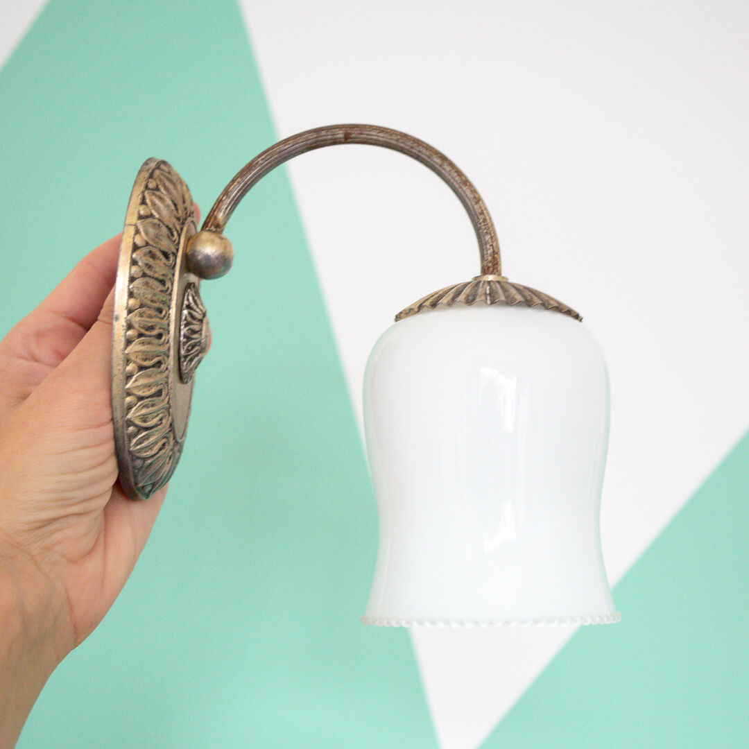 Metal wall lamp and serrated glass globe
