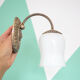 Metal wall lamp and serrated glass globe