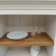 Craft furniture enhanced in pearl gray, shelves and top in raw wood.