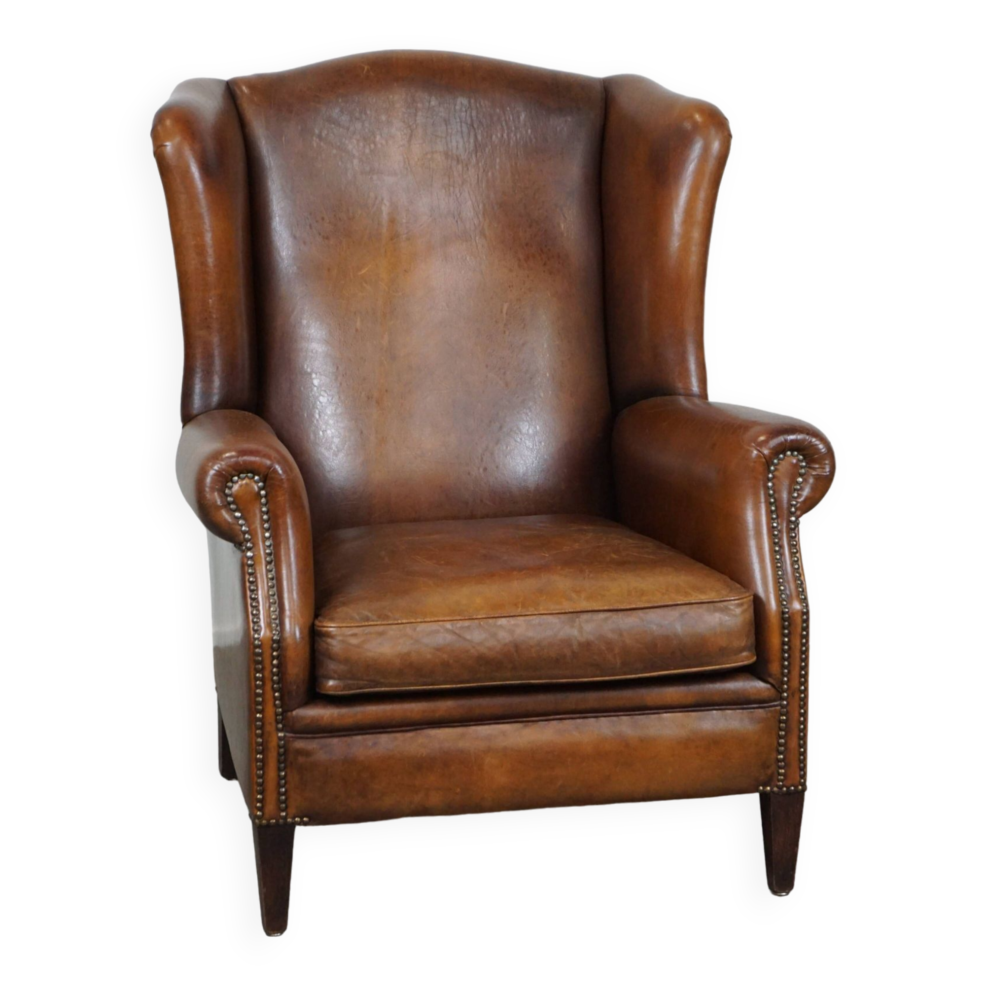 especially comfortable wingback chair made of sheepskin leather, stunning colors