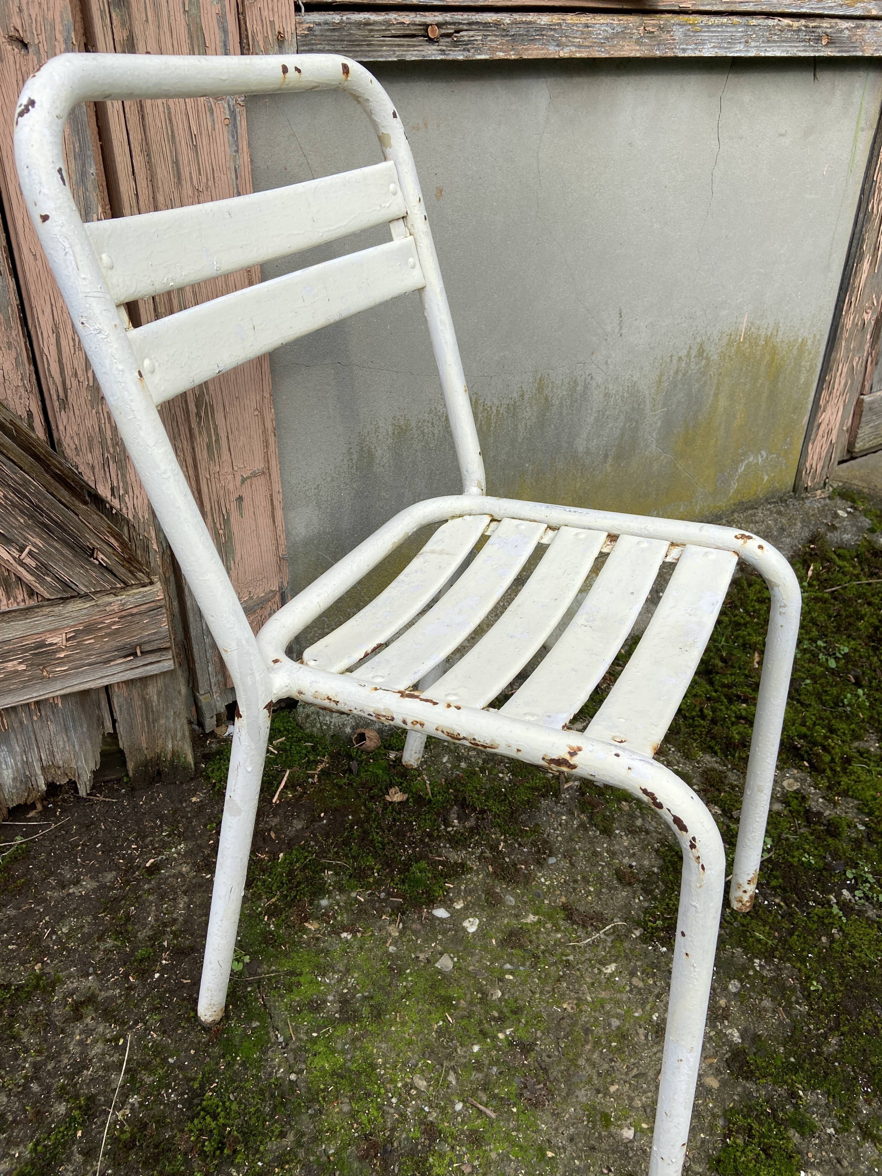 Duo of vintage metal Tolix chairs