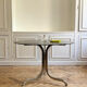Table ronde en verre fumé et chrome