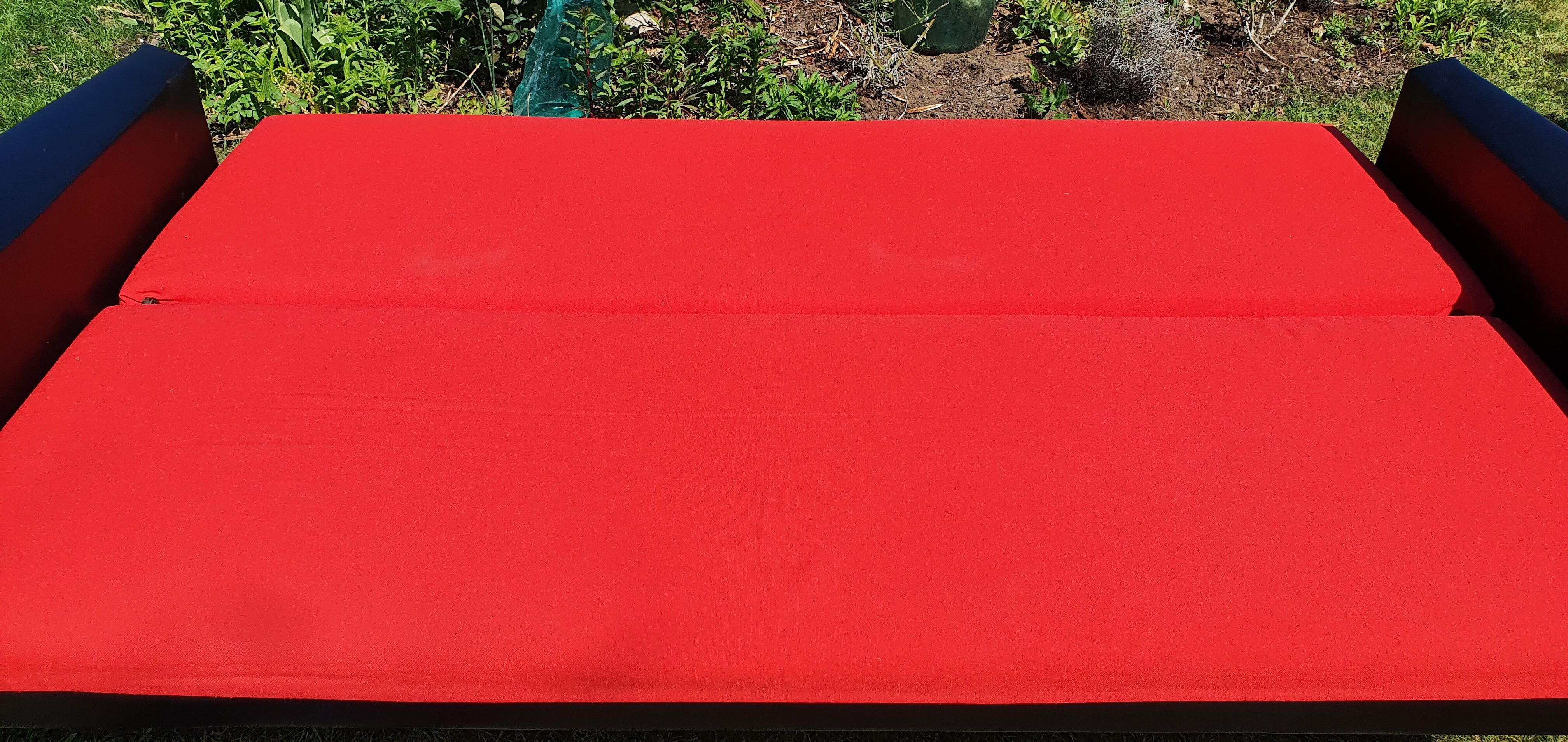 Vintage sofa 3 places convertible, red fabric and black skaï.1960s.