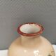 Italian vase from the 70s, in a delicate pink color with floral decoration.