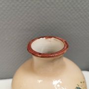 Italian vase from the 70s, in a delicate pink color with floral decoration.