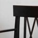 Bridge armchair in wood and leather, work from the early 20th century.