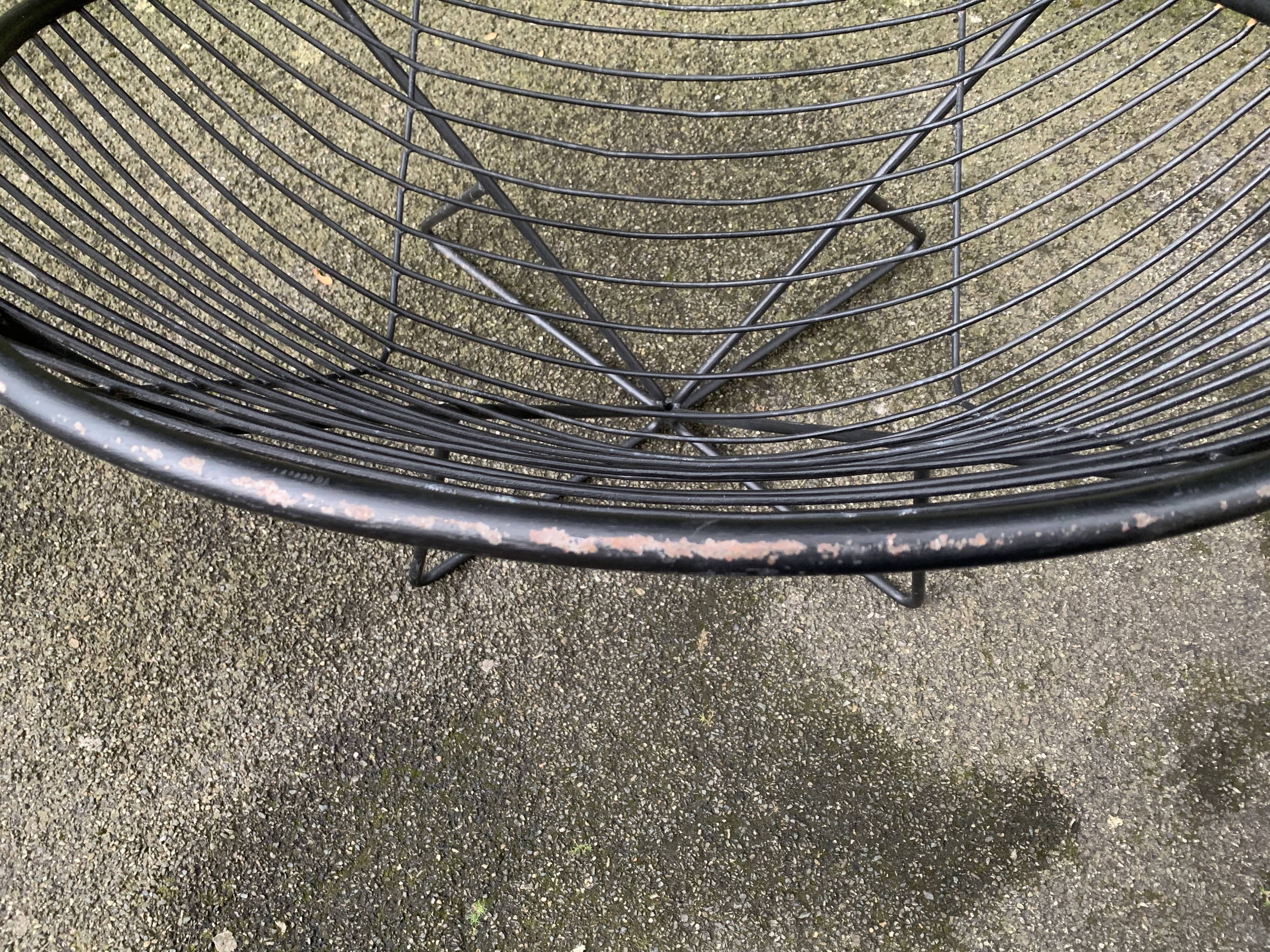 Pair of round chairs in black tubular steel 1960