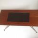 Vintage coffee table from the 1950s in mahogany and metal, with a tabletop width of 110 cm.