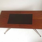 Vintage coffee table from the 1950s in mahogany and metal, with a tabletop width of 110 cm.