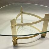 Table basse années 70  forme libre laiton et verre