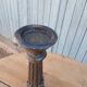 2 carved wooden candlesticks