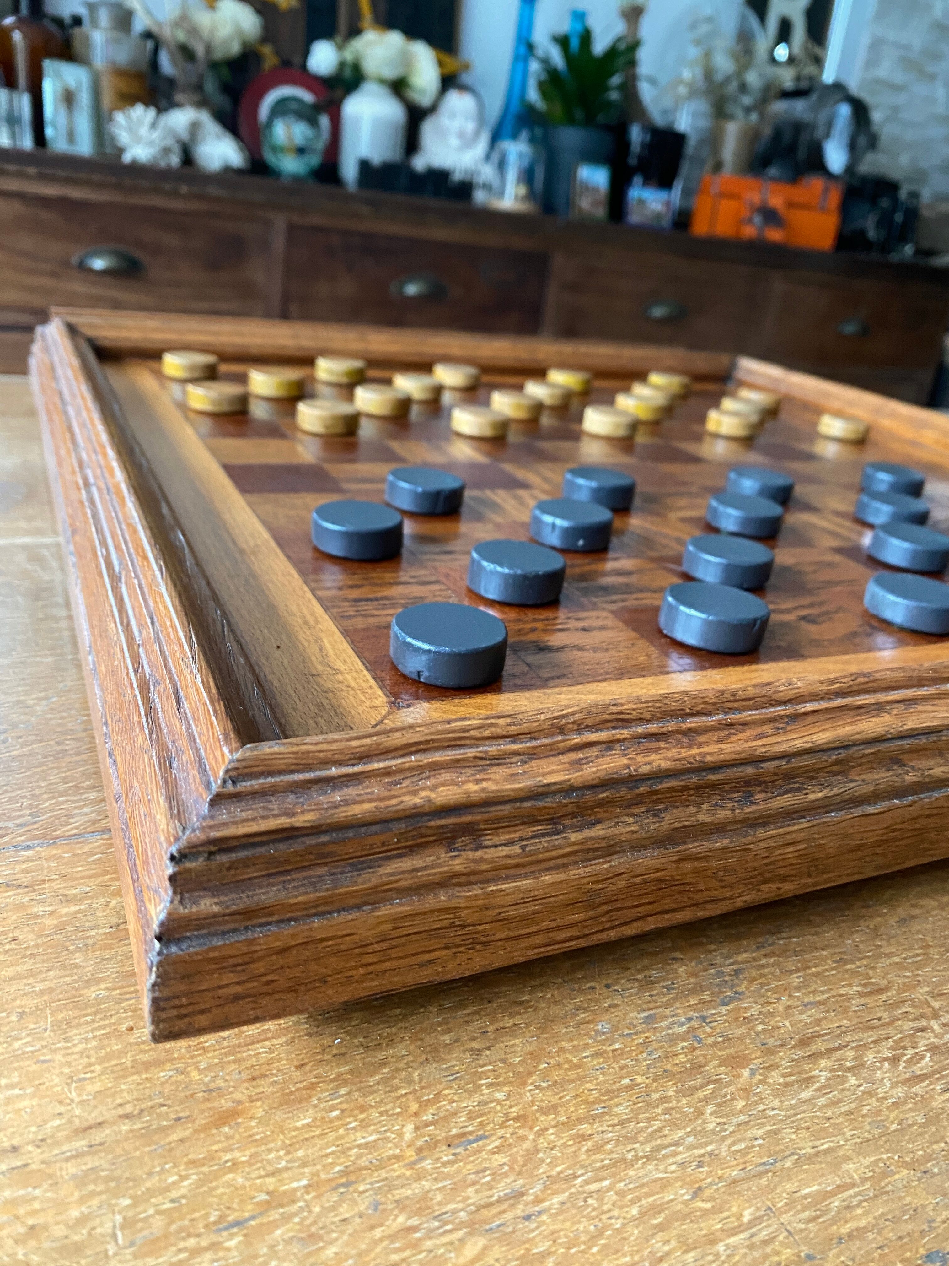 Old wooden checkers board