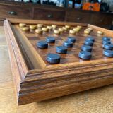 Old wooden checkers board