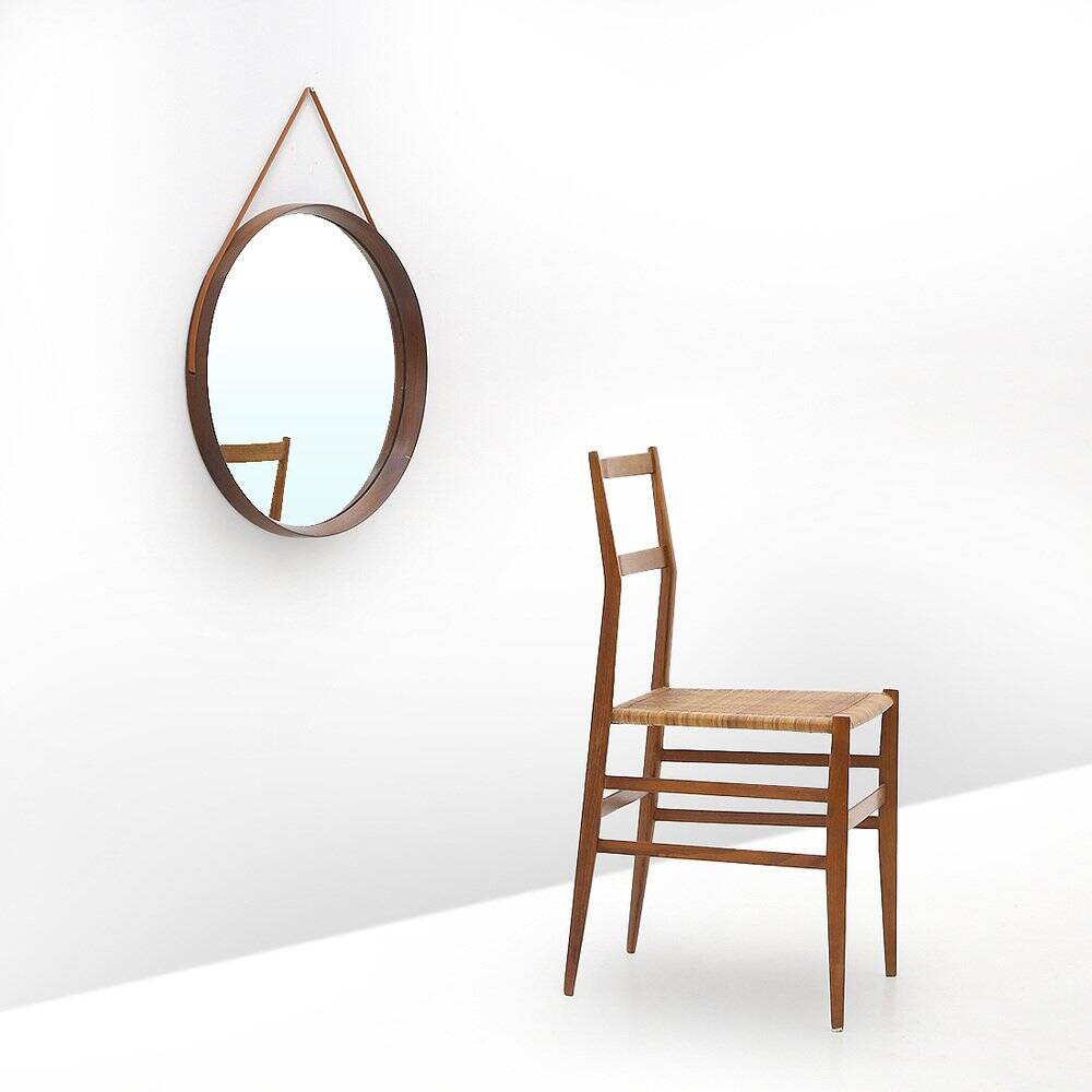 Round mirror with leather strap, 1960s