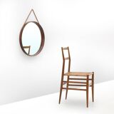 Round mirror with leather strap, 1960s