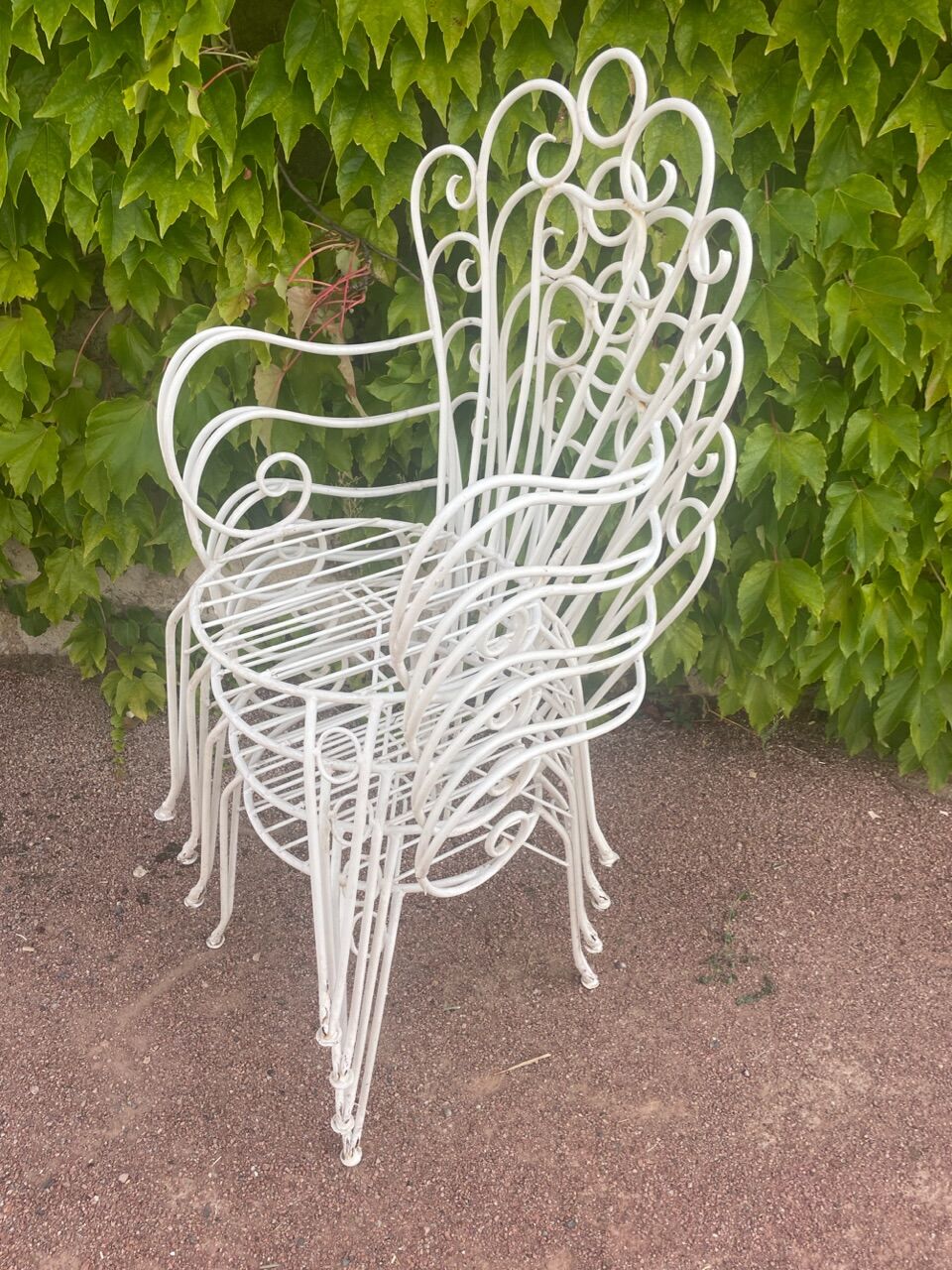 Provençal wrought iron armchairs