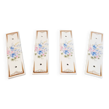 Lot de 4 plaques de propreté porcelaine de Limoges