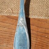 Silver-plated ladle in its screen