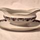 Sauceboat on a base Art Deco porcelain from Châteauroux by Gaston Sailly.