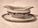 Sauceboat on a base Art Deco porcelain from Châteauroux by Gaston Sailly.