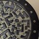 Black ceramic plate with beige geometric relief - 1970s Italian mid-century design