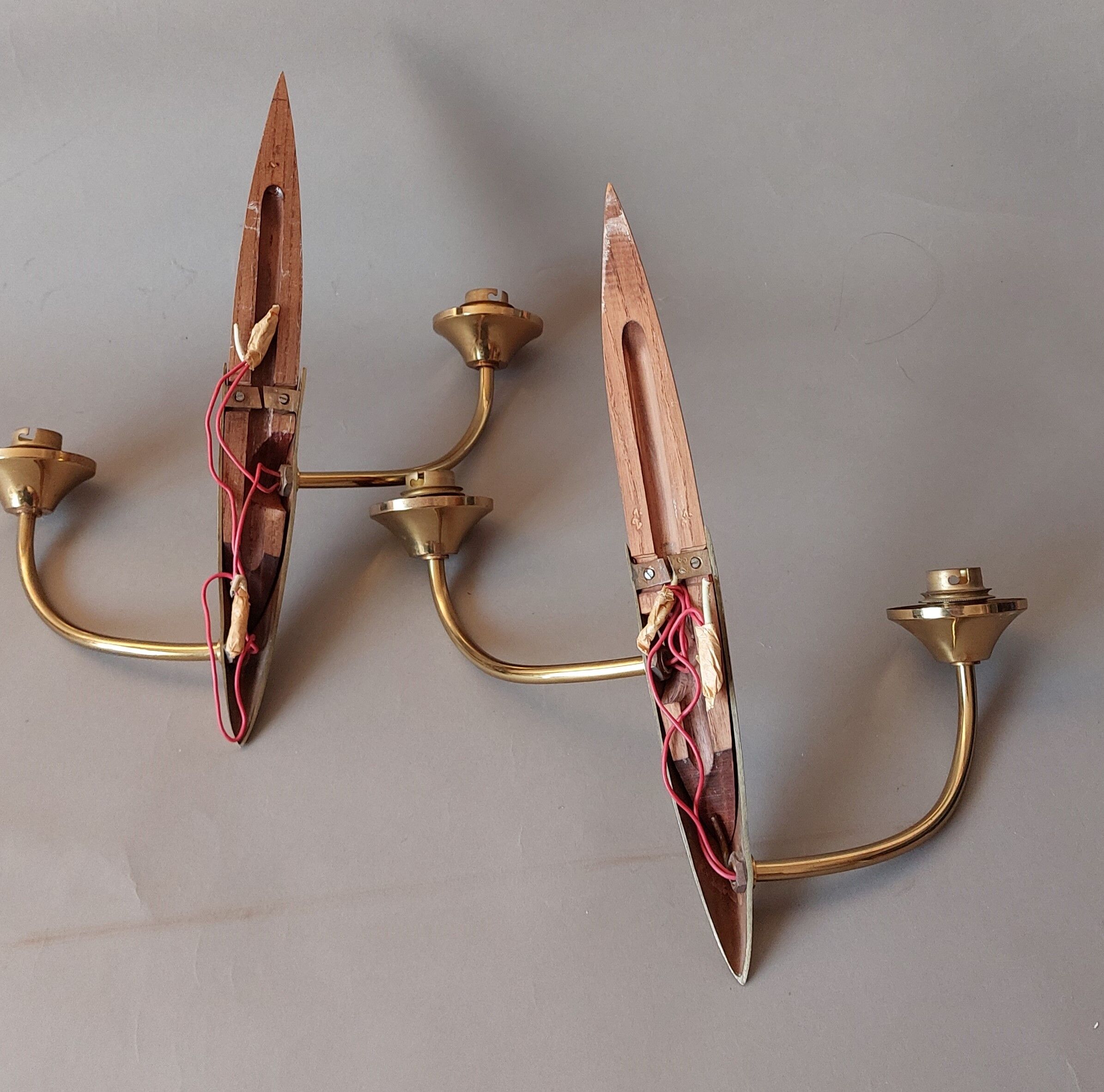 Pair of wood and gilded brass sconces 1950 boat hulls with 2 lights.