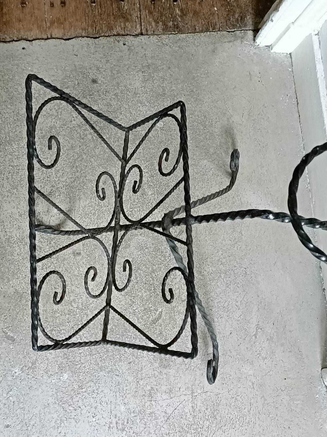 Vintage wrought iron magazine rack