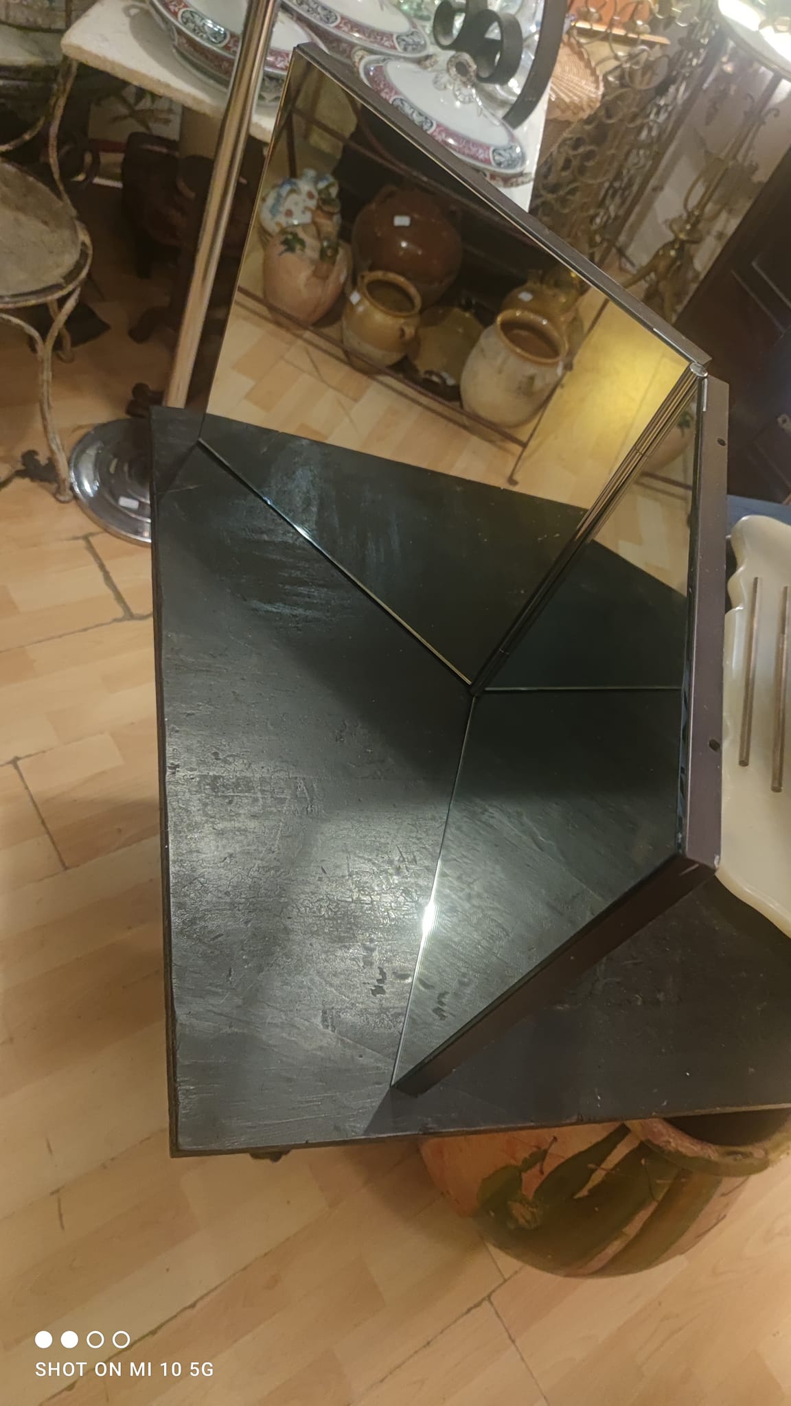 Wall mirror with a wooden frame and Wenge finish, dating from the late 19th century