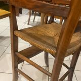 Antique straw-covered high chair