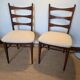 Pair of vintage wood and corduroy chairs