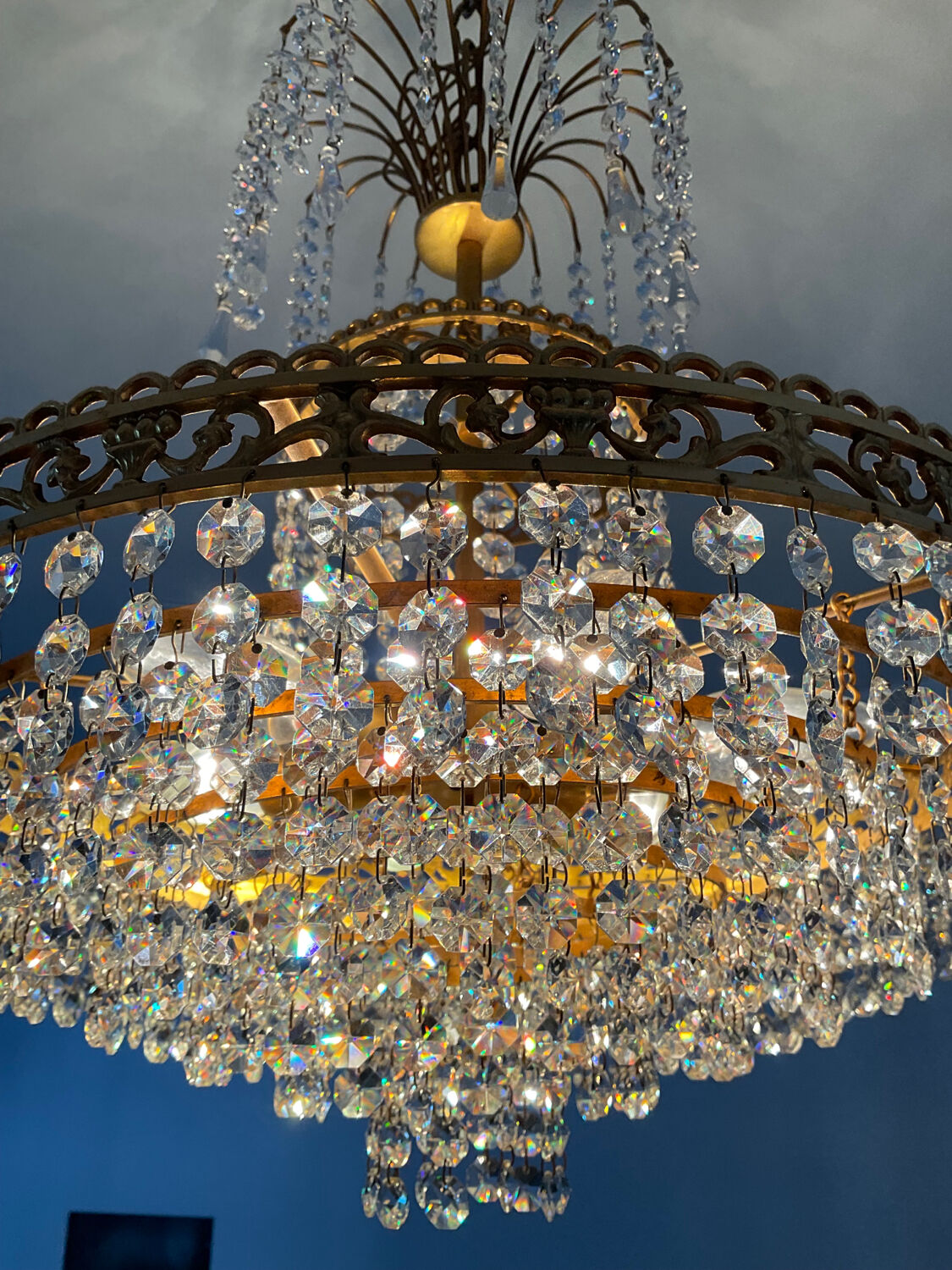 Cascade chandelier with crystal and bronze tassels